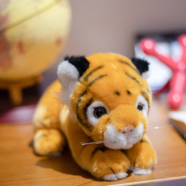 Bébé tigre en peluche adorable à adopter