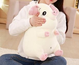 Grosse peluche cochon attachant