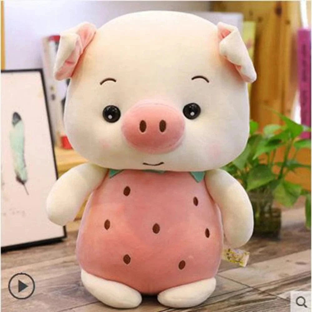 Peluche cochon déguisé en fraise