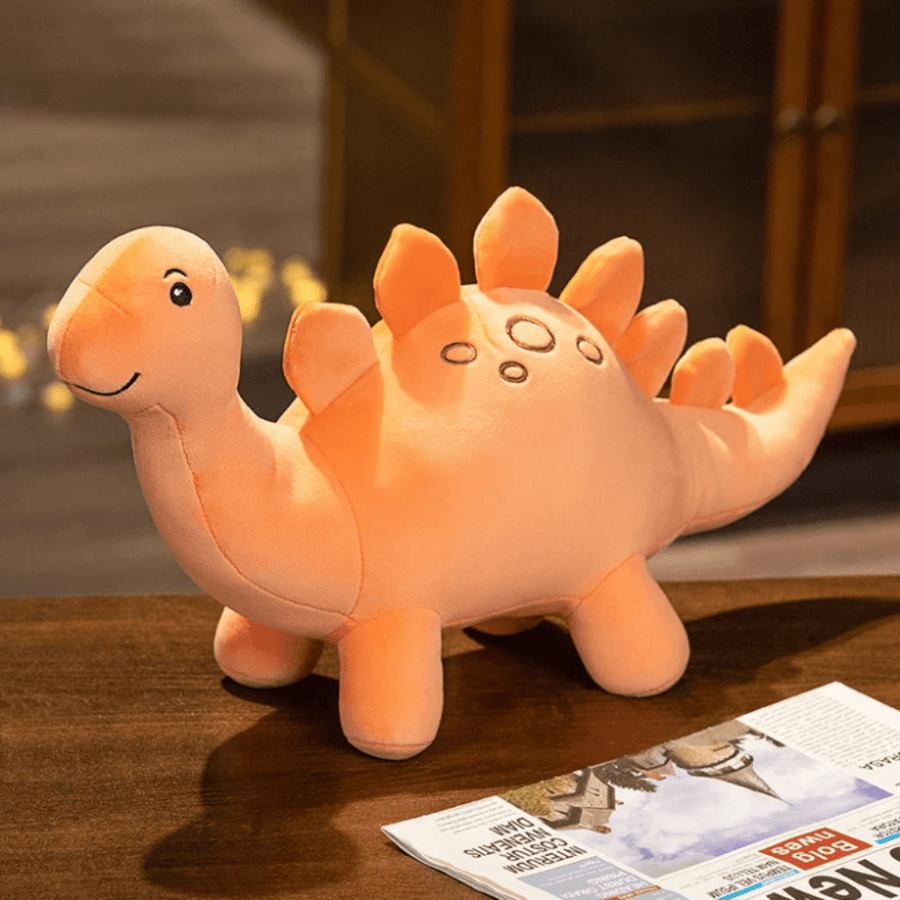 Peluche dinosaure orange à pointes sur le dos 35cm