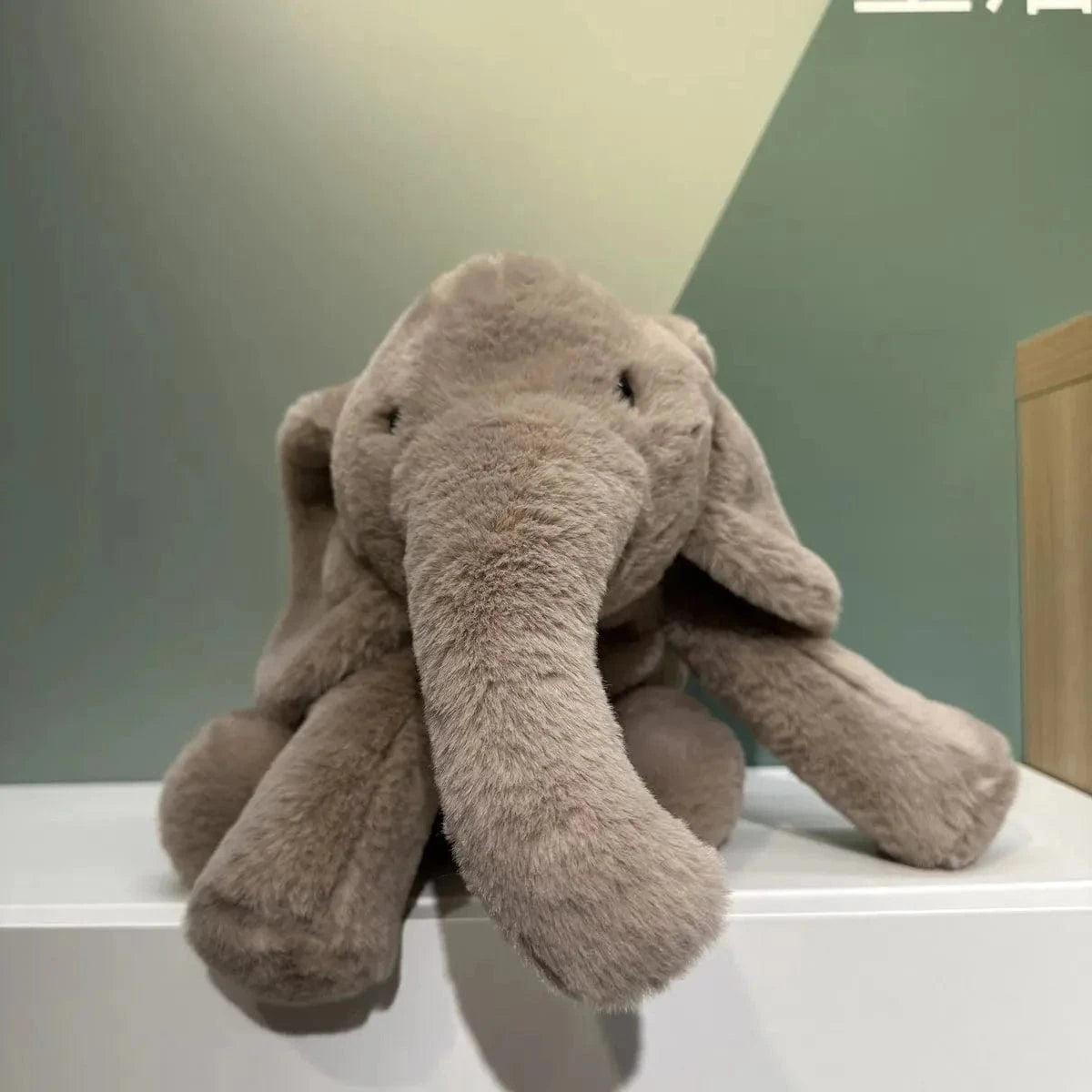 Peluche éléphant gris tout doux