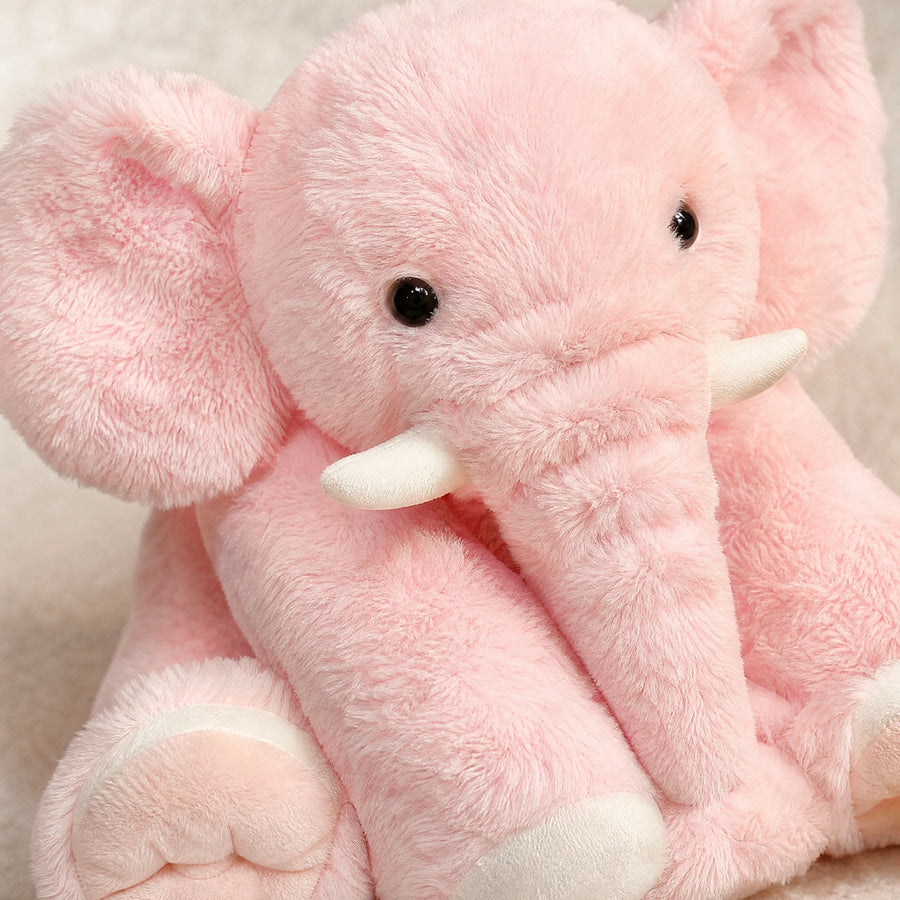 Peluche éléphant rose moelleuse aux petites défenses - Détail matière