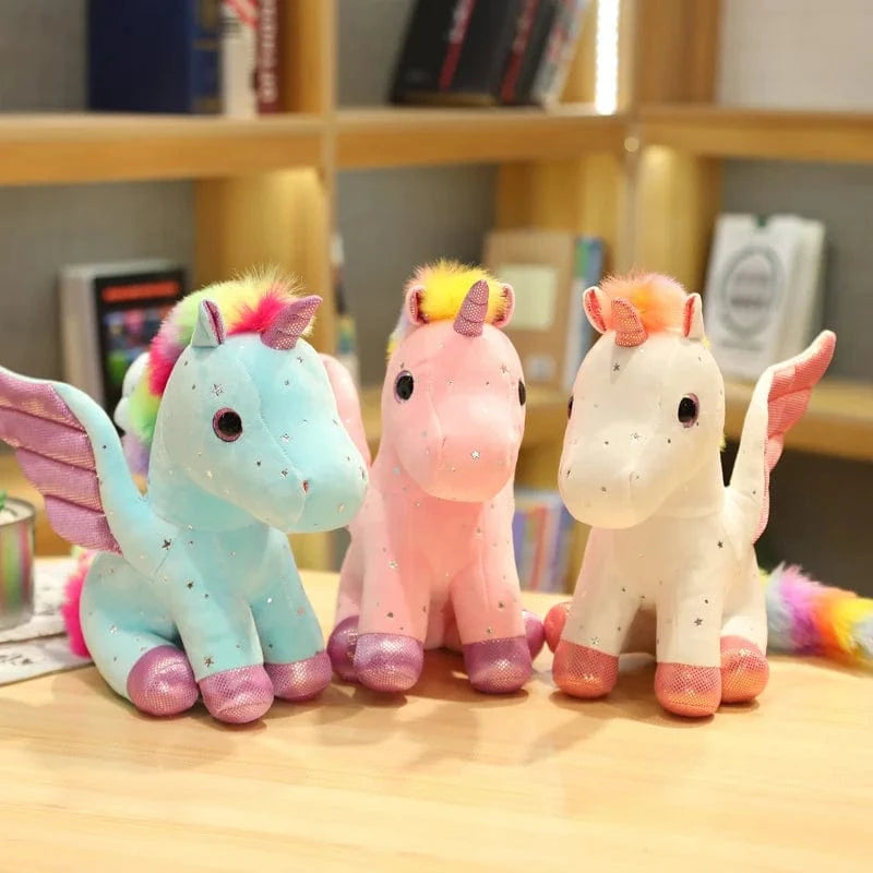 Peluche licorne bleu à crinière arc-en-ciel magique
