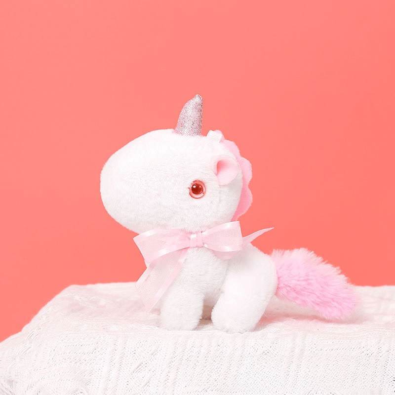 Peluche licorne miniature douce avec nœud et cornet pailleté Blanc