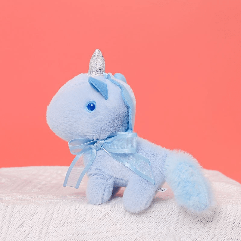 Peluche licorne miniature douce avec nœud et cornet pailleté Bleu