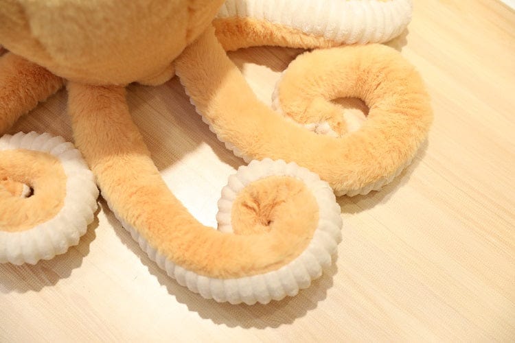 Peluche pieuvre contente et colorée
