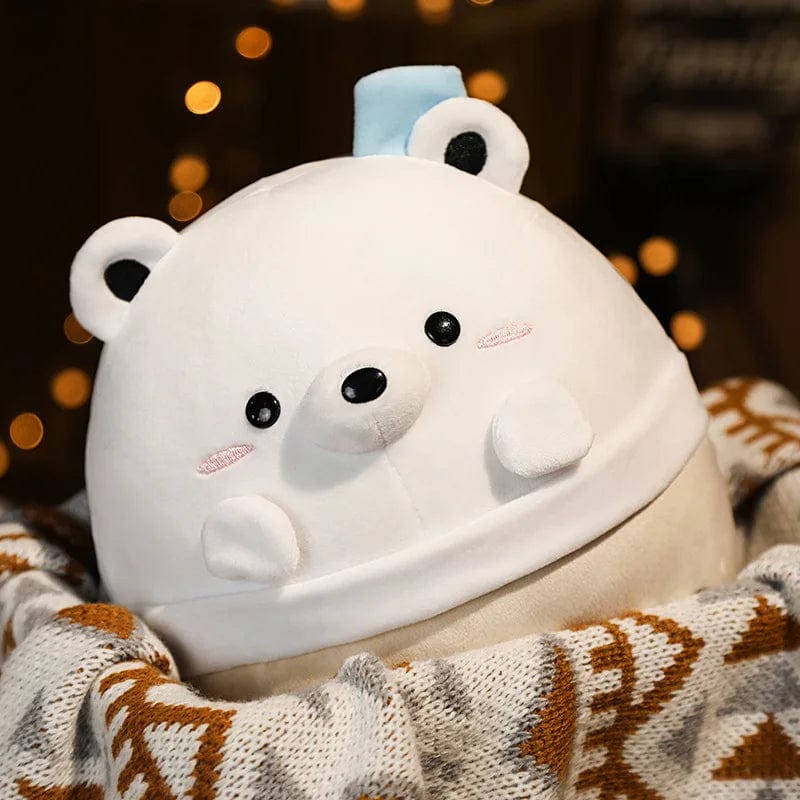 Peluche squishmallow ours blanc dans un bol