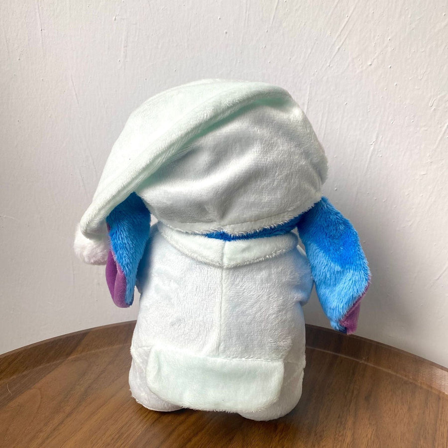 Peluche Stitch en pyjama bleu avec bonnet de nuit