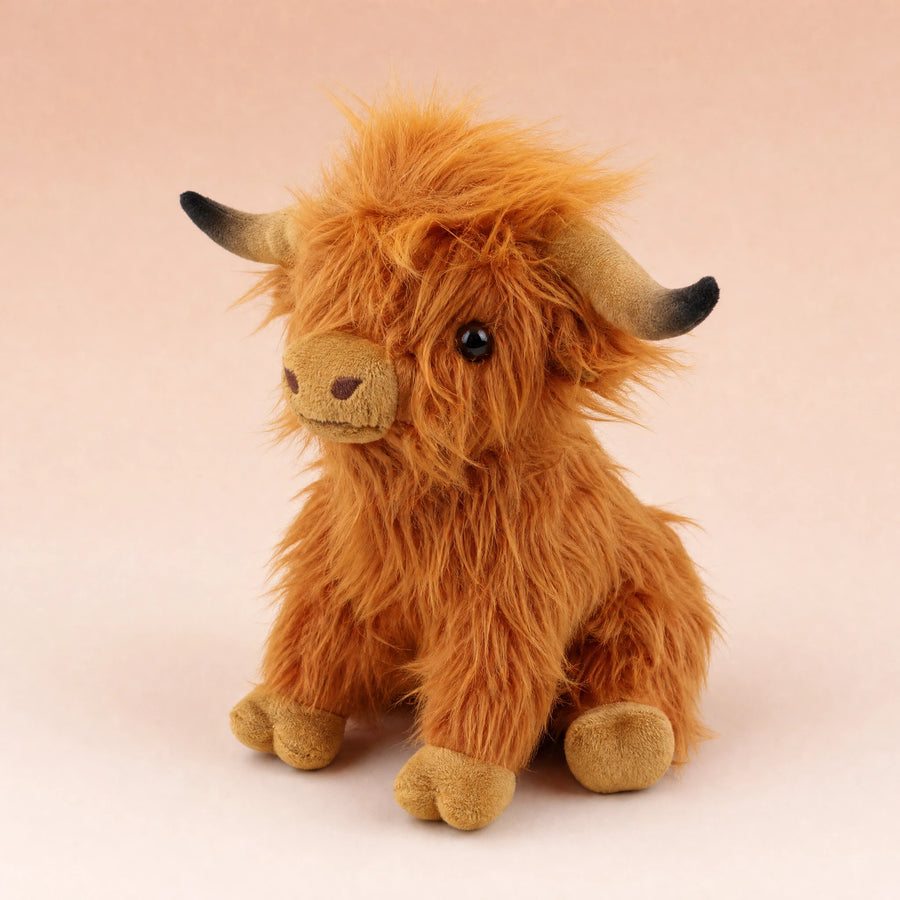 Peluche Vache Highland à Poils Longs Blanc ou Marron - Fond beige rosé, autre angle