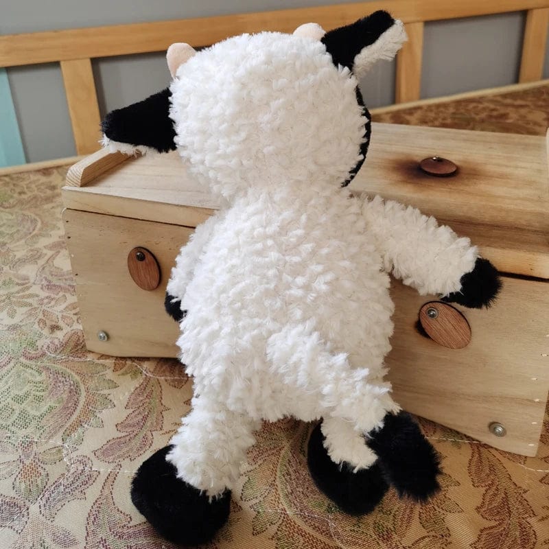 Peluche vache mignonne à fourrure blanche