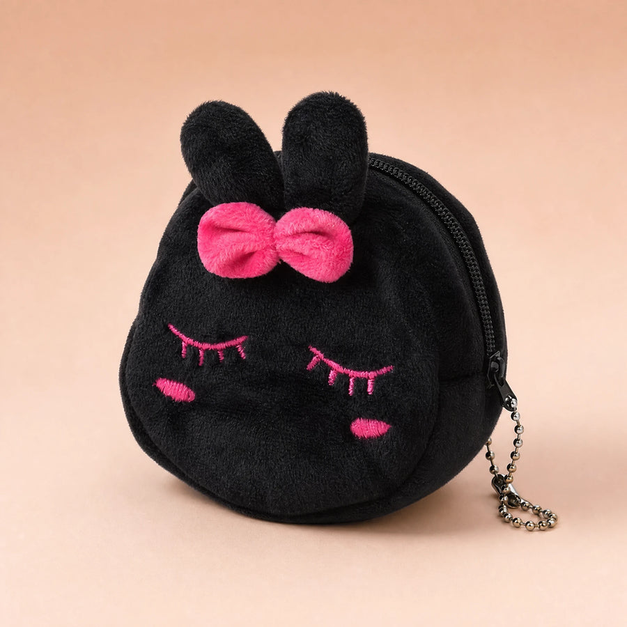 Sac Peluche Lapin Noir avec Nœud Rose et Broderies - Fond beige rosé, autre angle