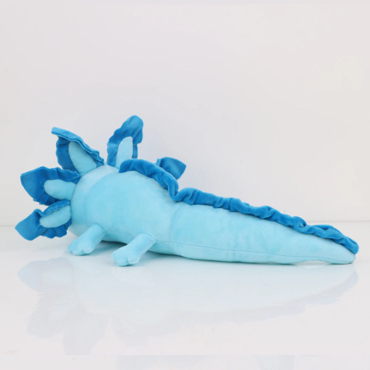 Peluche axolotl bleue, coloris qui convient à une chambre partagée