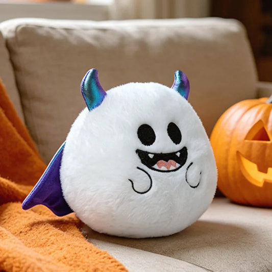 Peluche fantôme blanche en boule, format qui tient dans une main