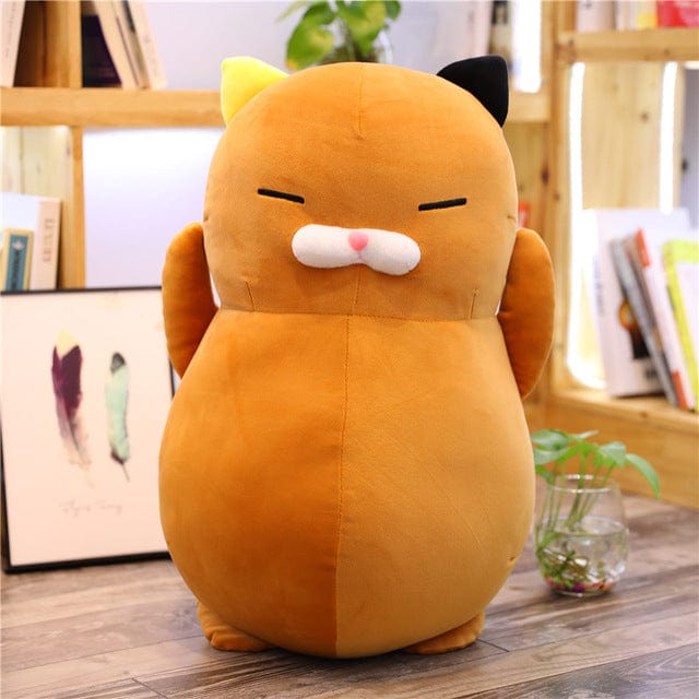 Chaton géant en peluche aux yeux rieurs