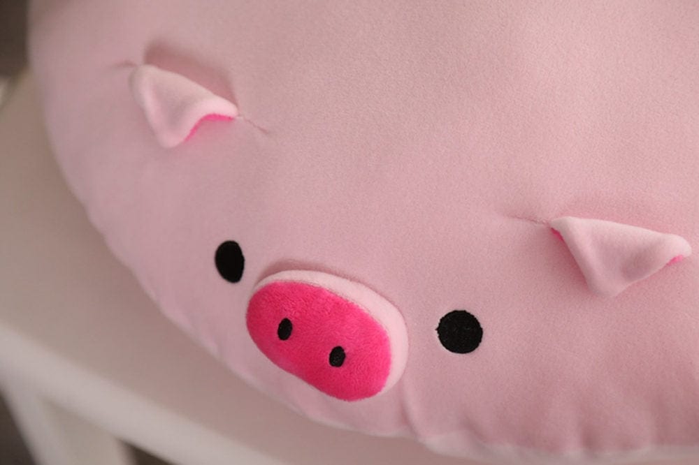 Coussin cochon au groin tout rose