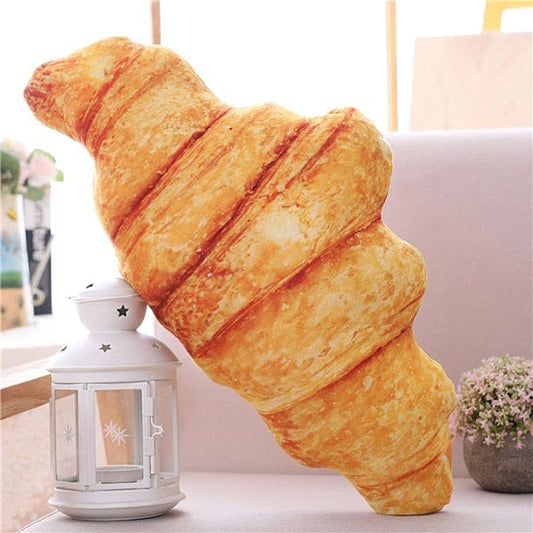 Coussin en peluche en forme de croissant