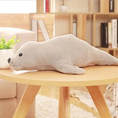 Coussin peluche bébé phoque absolument confortable gris