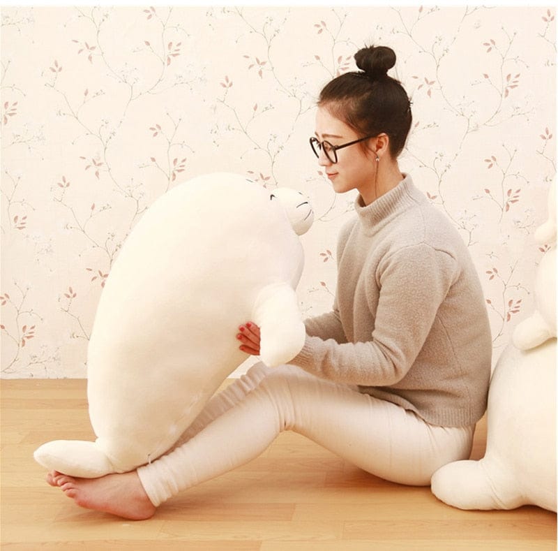 Coussin phoque blanc aux yeux rieurs