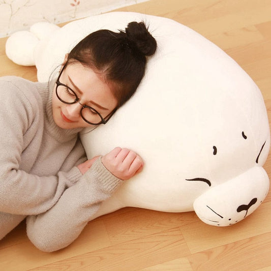 Coussin phoque blanc aux yeux rieurs