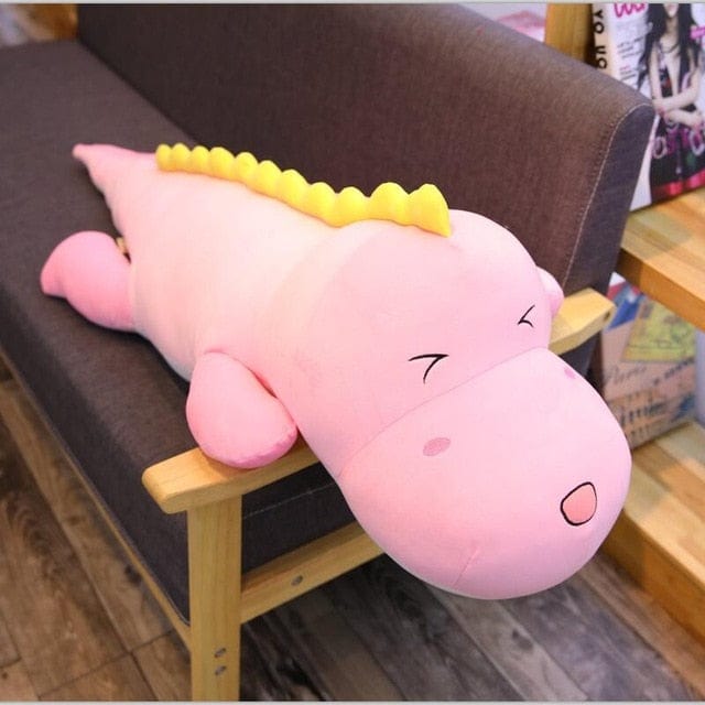 Dinosaure en peluche rose pour doudou