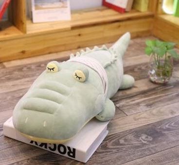 Douce peluche crocodile aux grands yeux