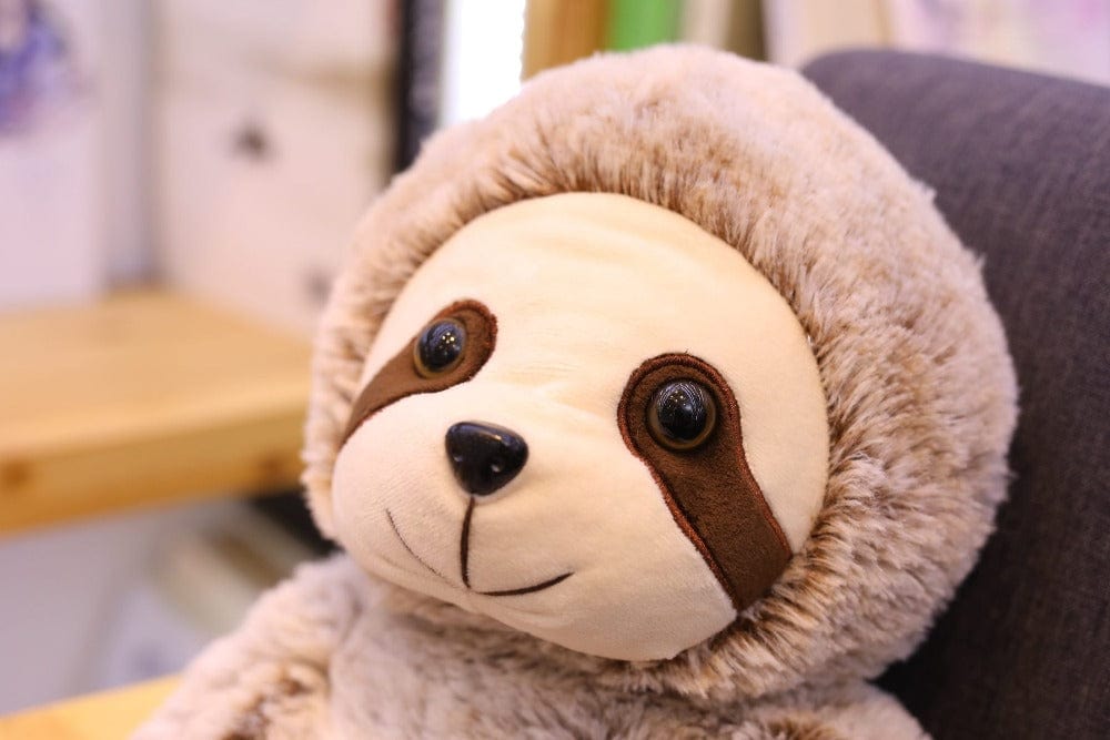 Doux doudou paresseux souriant 70 cm