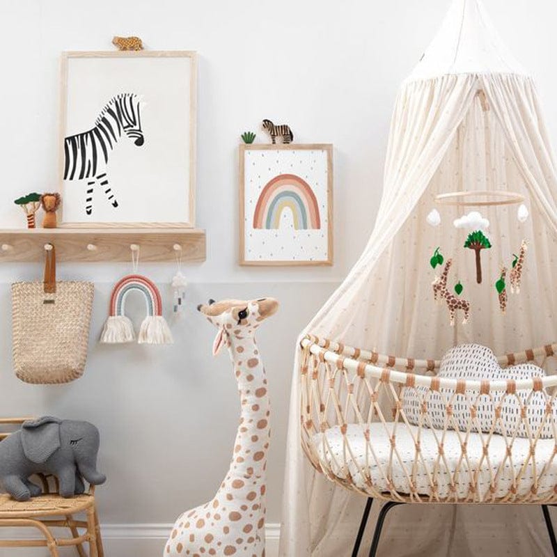 Grande peluche girafe aux grands yeux