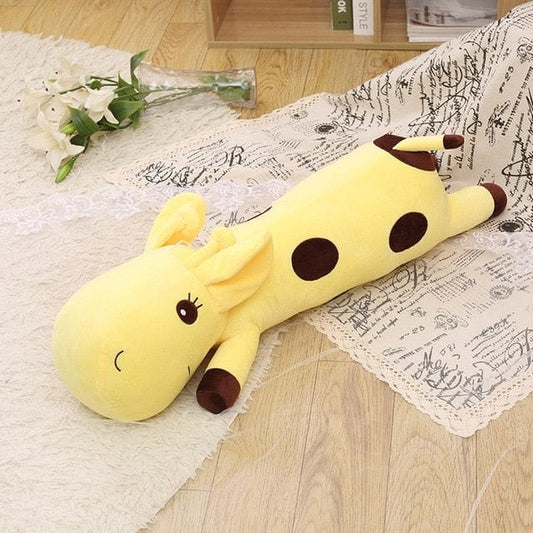 Gros doudou girafe aux yeux brillants et sympathiques