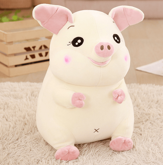 Grosse peluche cochon attachant