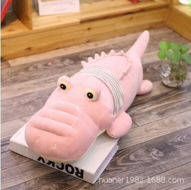 Grosse peluche rose crocodile remplie d'amour