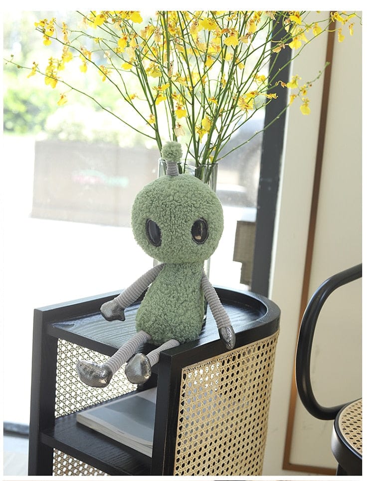 Jouet en peluche extraterrestre aux grands yeux