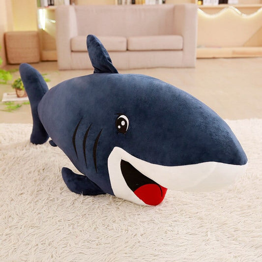 Jouet requin bleu sympa et aux yeux brillants