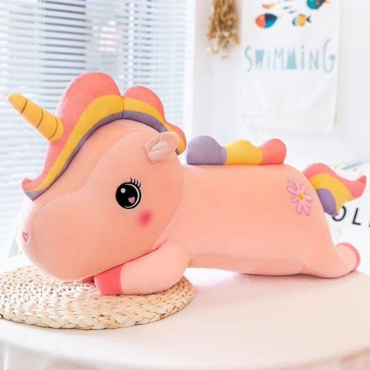 Licorne en peluche aux grands yeux brillants