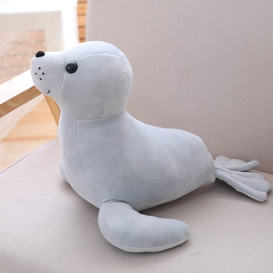 Otarie gris sympathique en animal en peluche