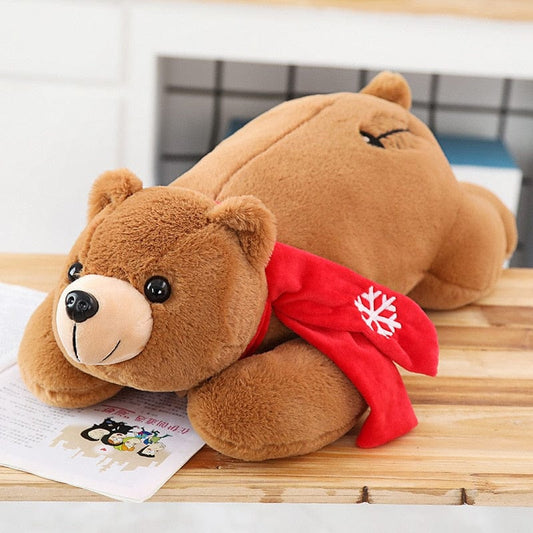 Ours brun en peluche aux yeux brillants