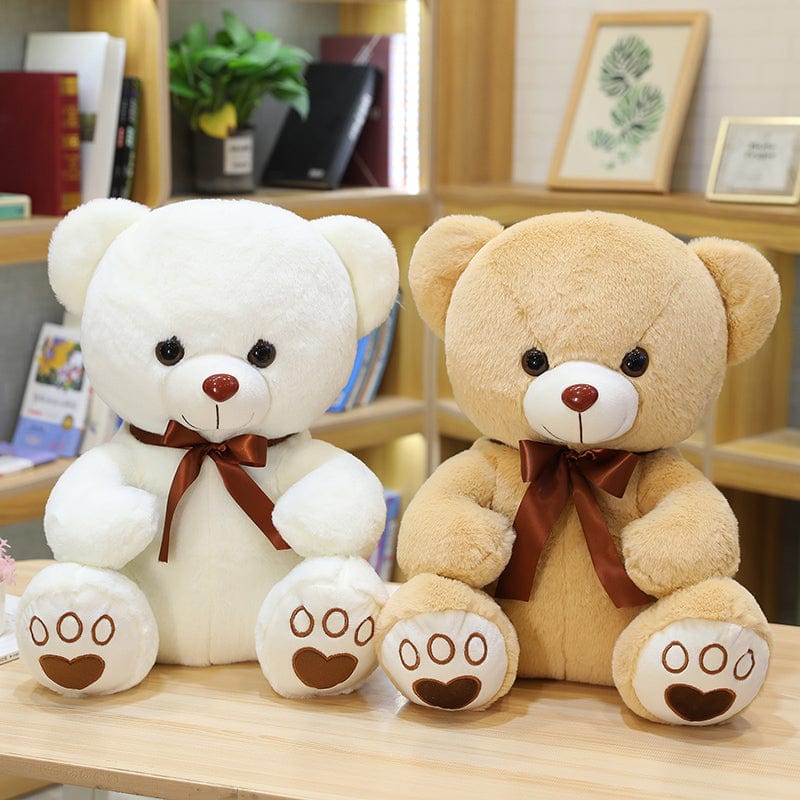 Ours en peluche coloré avec un petit nœud