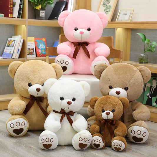 Ours en peluche coloré avec un petit nœud