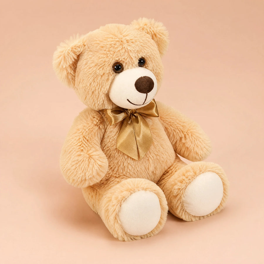 Ours en peluche nœud doré beige au regard tendre - Fond beige rosé, autre angle