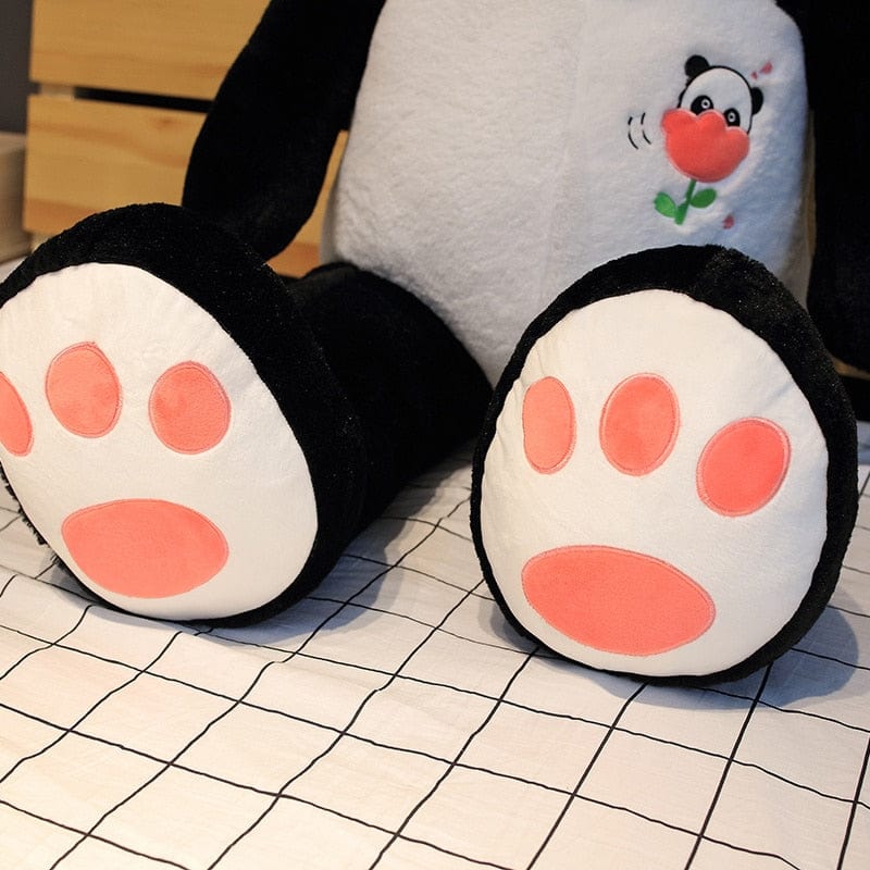 Panda géant en peluche à dorloter