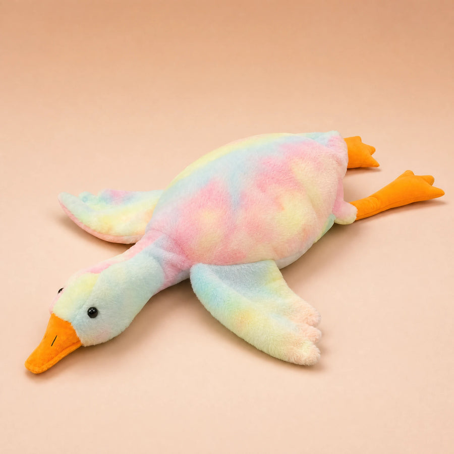 Peluche Canard Géante avec Petites Ailes Colorées - Fond beige rosé, autre angle