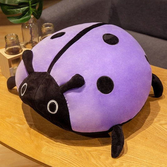 Peluche coussin mauve porte bonheur
