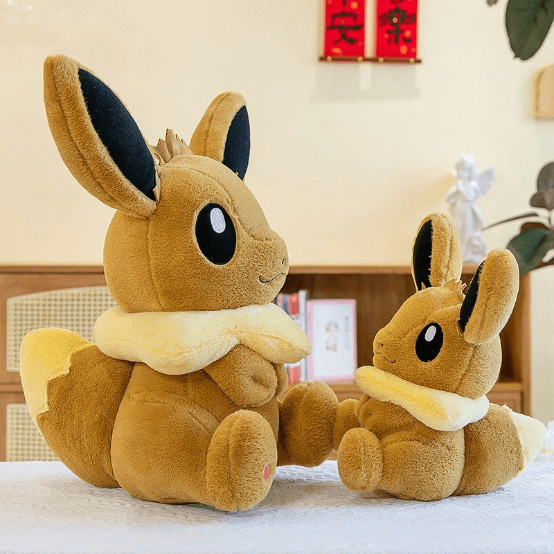 Peluche évoli pokémon assise toute douce