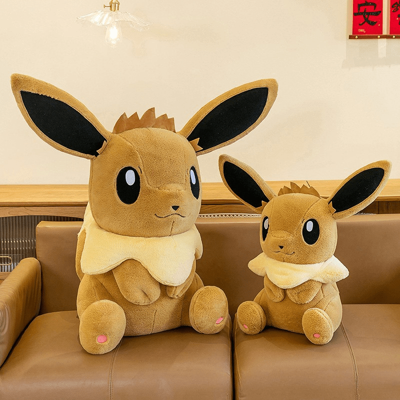Peluche évoli pokémon assise toute douce