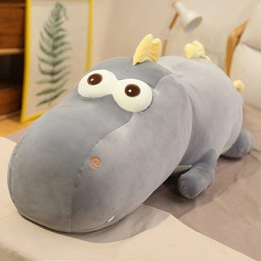 Peluche géante dino aux grand yeux