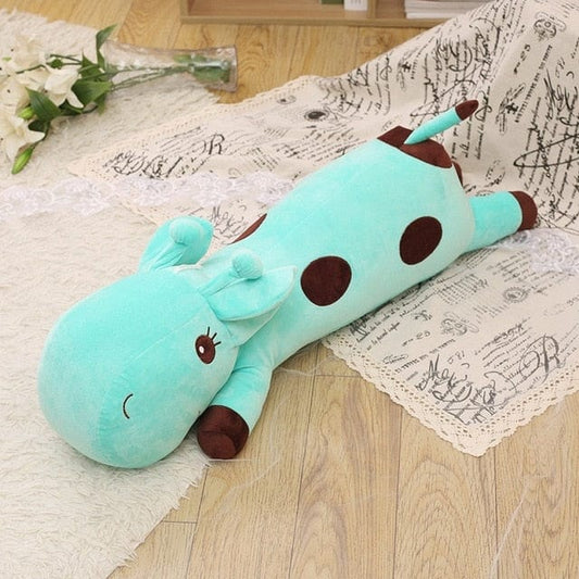 Peluche géante girafe bleue câline et moelleuse