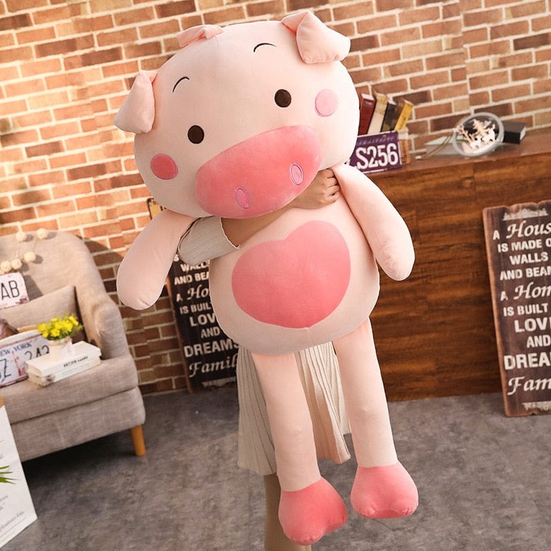 Peluche géante porcinet au grand cœur