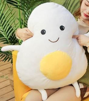 Peluche géante souriante en forme d’œuf