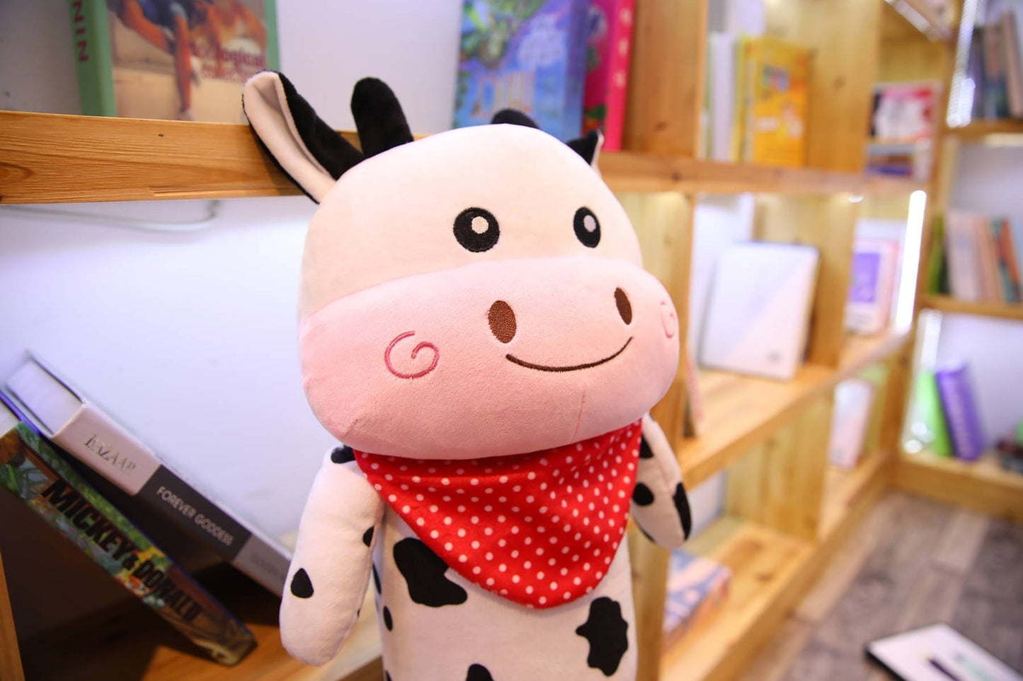 Peluche géante vache aux yeux brillants