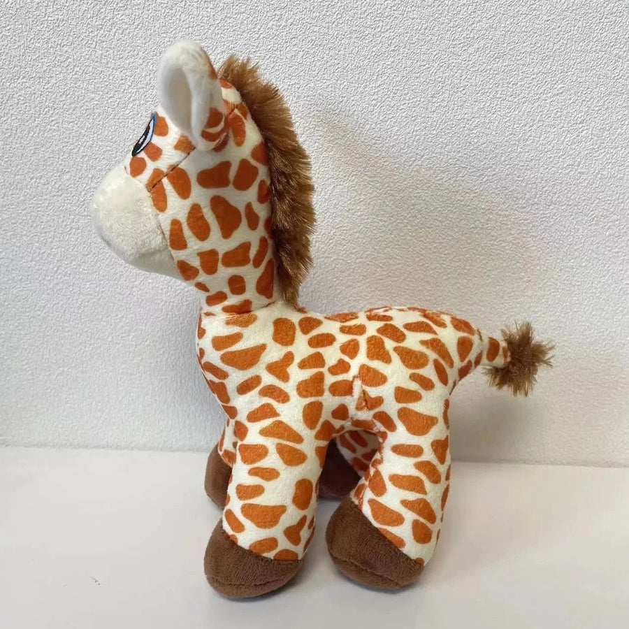 Peluche girafe aux gros yeux