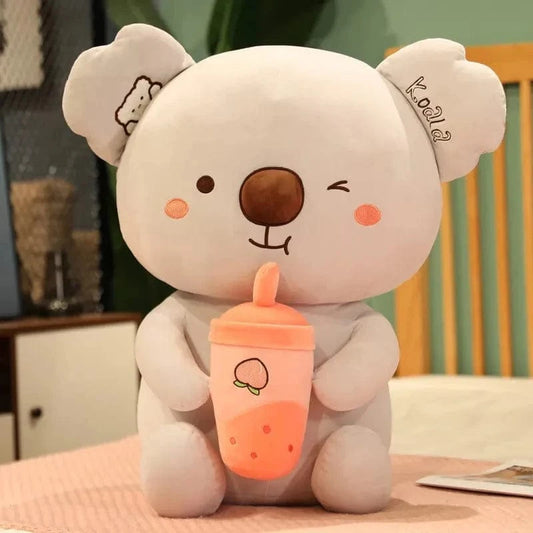 Peluche koala qui boit un bubble tea fraise
